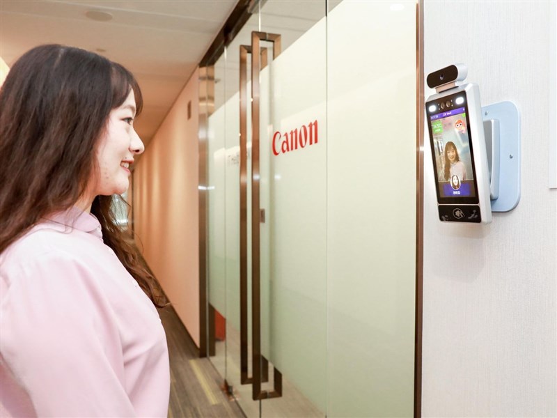 Canon Uses AI Cameras That Only Let Smiling Workers Inside Offices