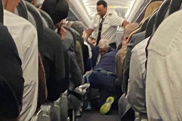 In Video: Passengers Take Down Man Who Tried To Open Aircraft Door