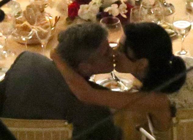 George Clooney and Amal Alamuddin Kiss During Romantic Dinner in Italy