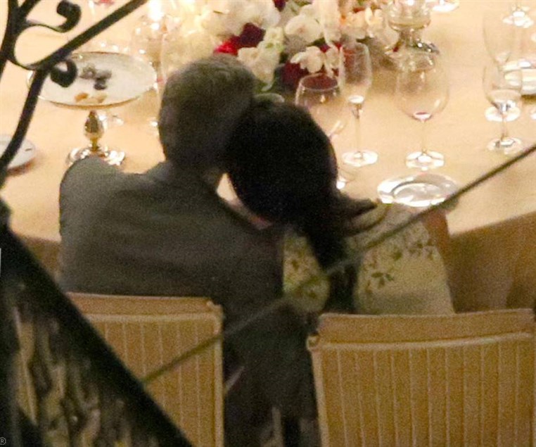 George Clooney and Amal Alamuddin Kiss During Romantic Dinner in Italy