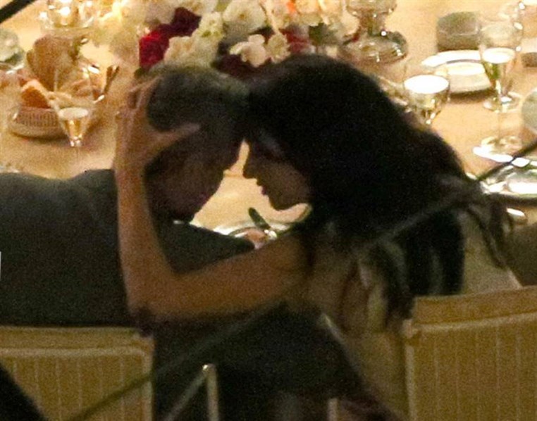 George Clooney and Amal Alamuddin Kiss During Romantic Dinner in Italy