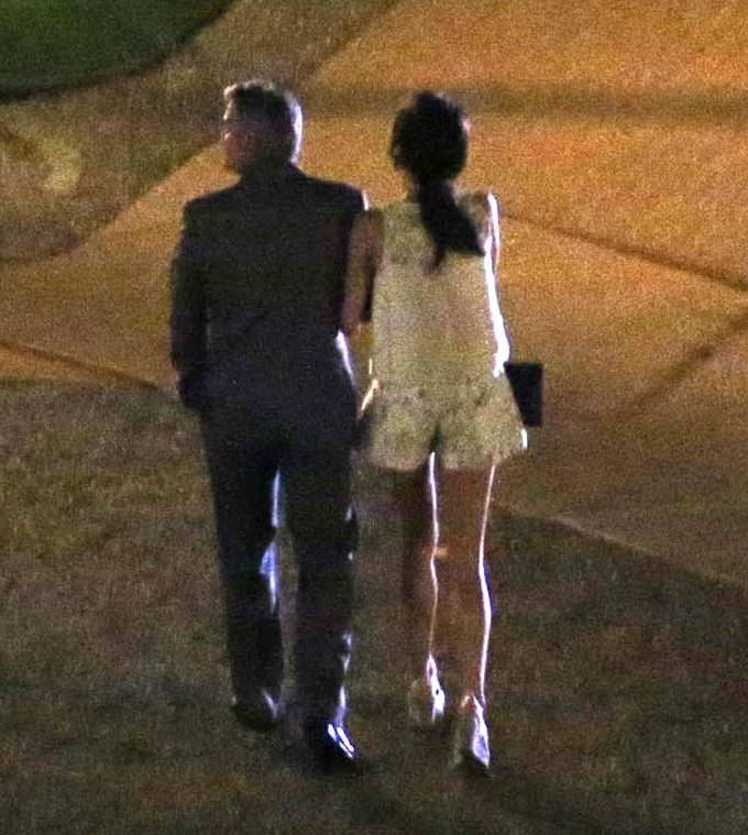 George Clooney and Amal Alamuddin Kiss During Romantic Dinner in Italy