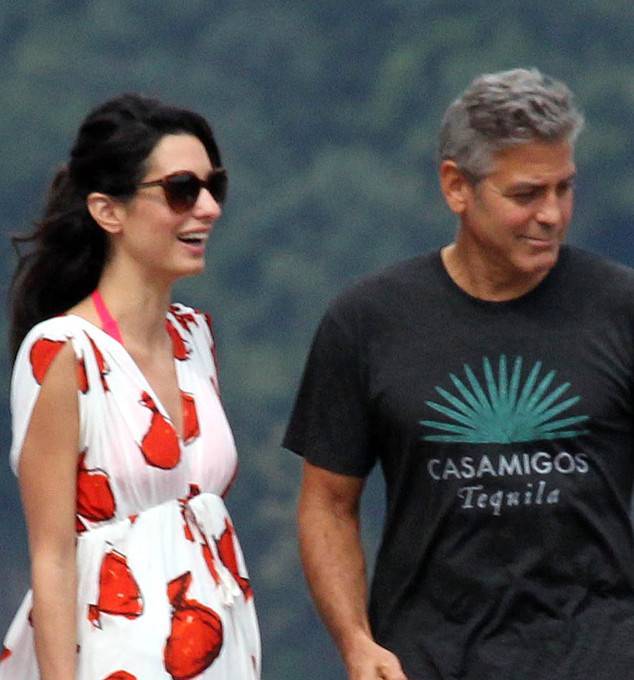 George Clooney and Amal Alamuddin Kiss During Romantic Dinner in Italy