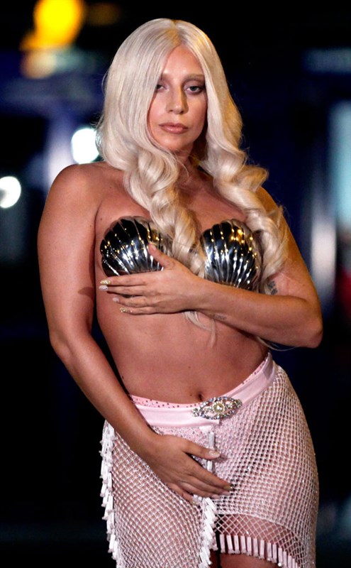 Lady Gaga Arrives at Athens Airport in Seashell Bra and Thong