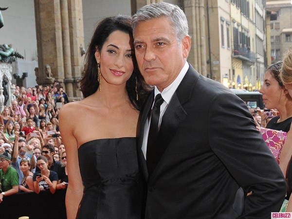 George and Amal said to be considering adopting an orphan from a war-torn country 