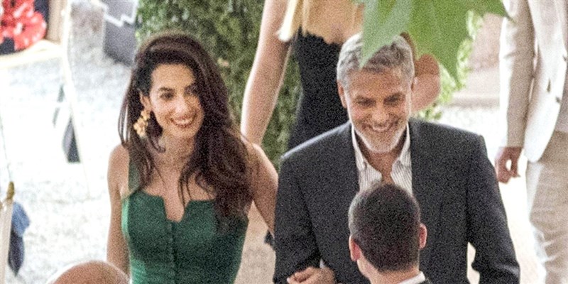 Amal Clooney Glows in Emerald Green During Dinner in Italy