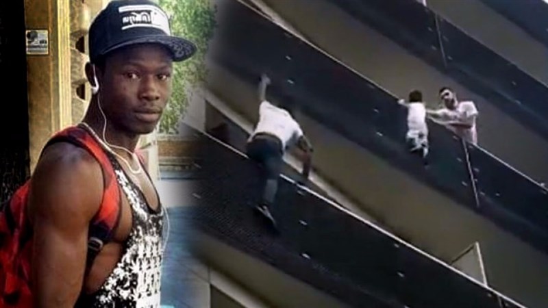 'Spider-Man' of Paris climbs four storeys to rescue dangling boy