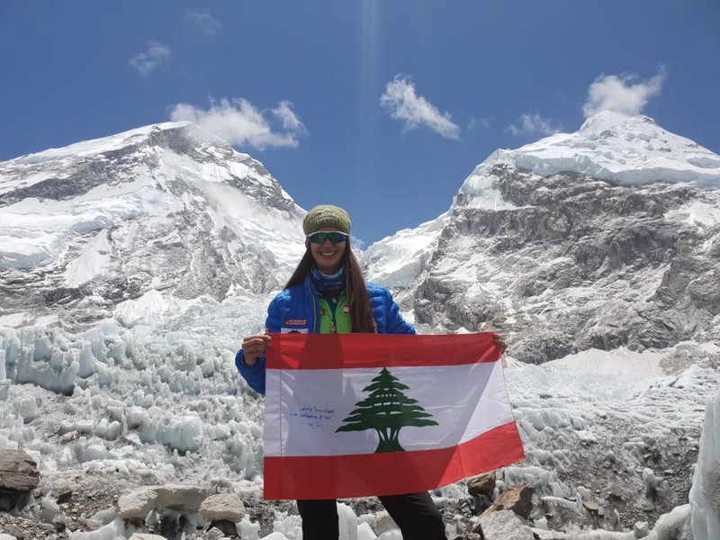 Joyce Azzam Raises The Lebanese Flag signed by President Michel Aoun