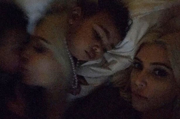 Kim Kardashian and North West pose for adorable bed selfies together