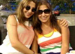 Nancy Ajram drinking coffee with her Mom