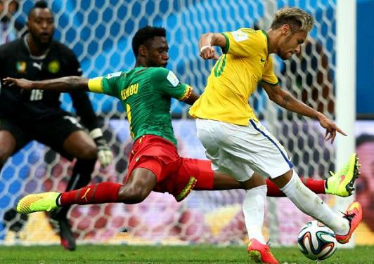 Neymar brilliance sends Brazil through 