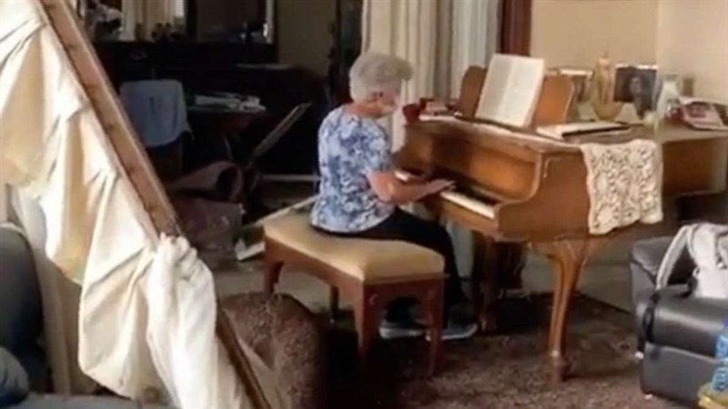 Beirut grandmother plays Auld Lang Syne on piano amid wreckage of home destroyed by port explosion