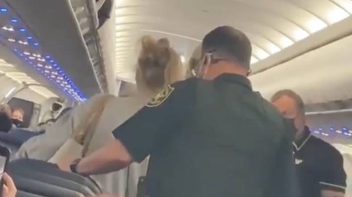In Video: Woman Gets Arrested After Lighting Up Cigarette On Plane