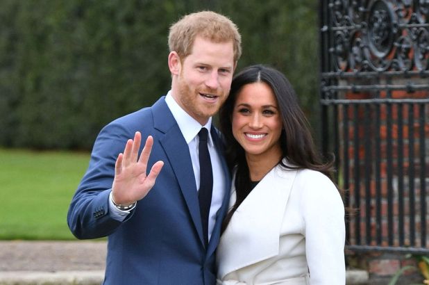 Prince Harry And Meghan Markle 'Step Back' From Royal Family Roles