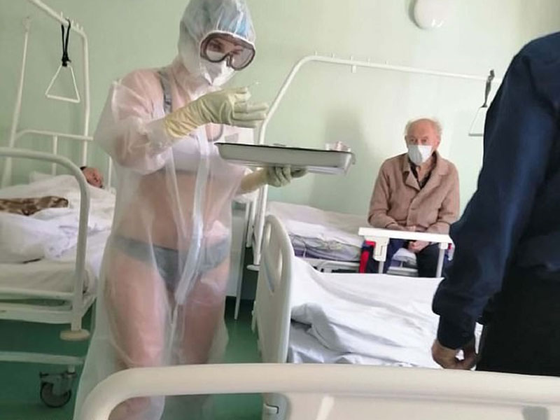 Russian Nurse sanctioned for wearing revealing outfit while treating COVID Male patients