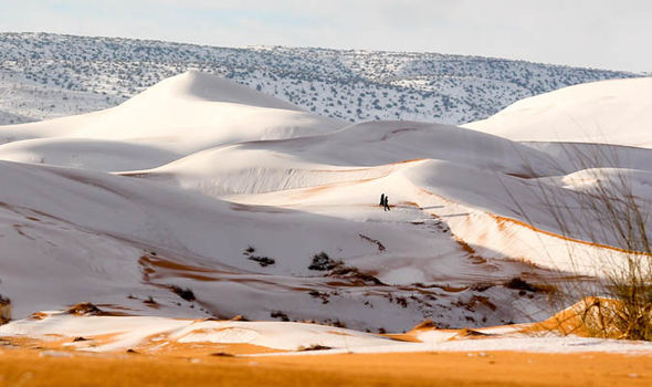 Amazing Photos Show Snow On The Dunes Of The Sahara Desert
