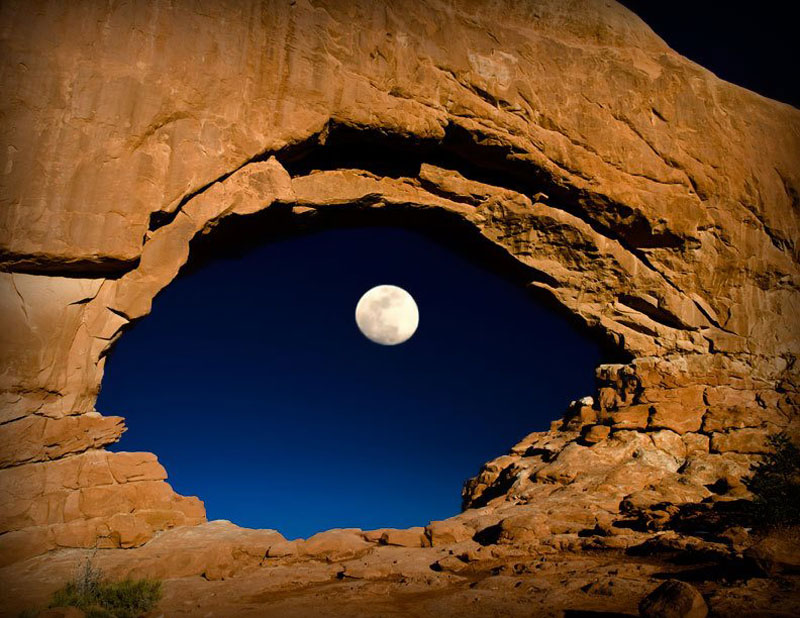 In Pictures: Full Moon Looks Like Giant Eye In Stunning Rock Arch Photograph