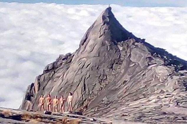 Malaysian tourists posing naked blamed for causing earthquake that killed 16