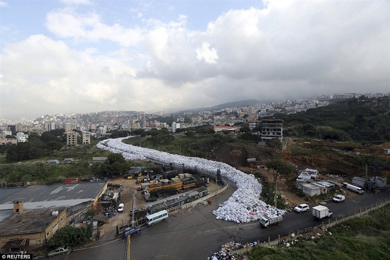 River of trash chokes Beirut suburb as city's garbage crisis continues