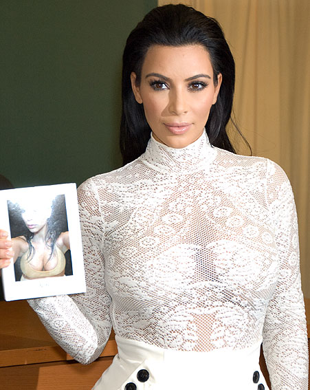 Kim Kardashian BANNS fans from taking selfies at her book launch