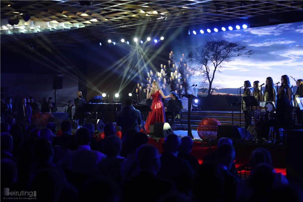 Tania Kassis illuminates Tripoli in a huge Christmas concert with a sublime red dress designed by Robert Abi Nader