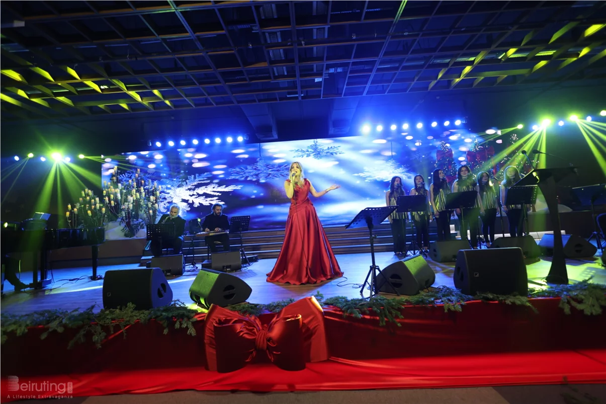 Tania Kassis illuminates Tripoli in a huge Christmas concert with a sublime red dress designed by Robert Abi Nader