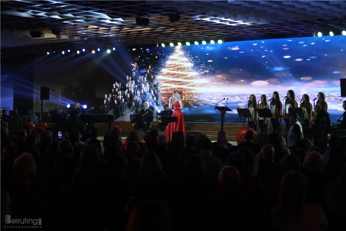 Tania Kassis illuminates Tripoli in a huge Christmas concert with a sublime red dress designed by Robert Abi Nader