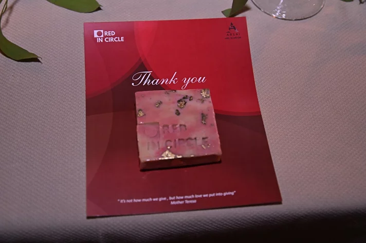 Red in Circle-A Night of Giving and Growth