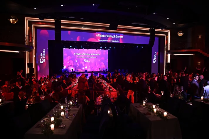 Red in Circle-A Night of Giving and Growth