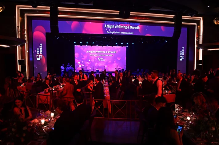 Red in Circle-A Night of Giving and Growth