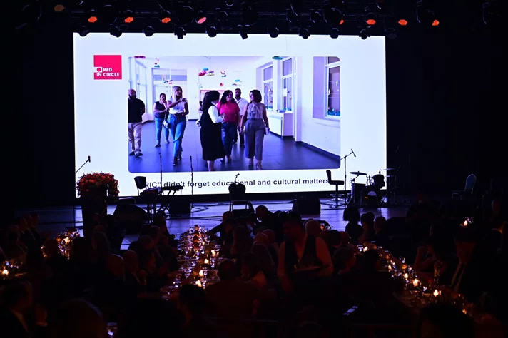 Red in Circle-A Night of Giving and Growth